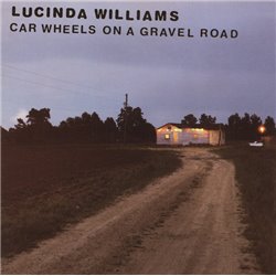 Car Wheels On A Gravel Road